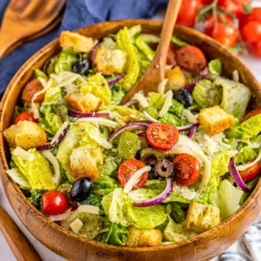 A bright and colorful Simple Italian Salad with fresh vegetables and dressing.