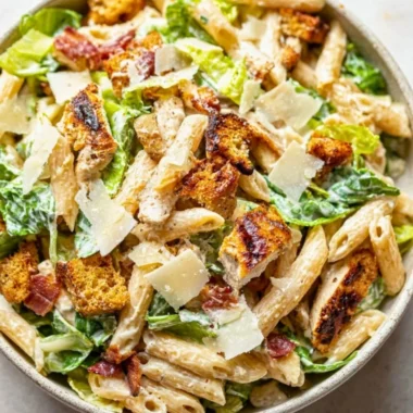 Delicious Chicken Caesar Pasta Salad with chicken, romaine, and parmesan cheese