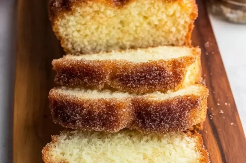 Freshly baked Cinnamon Sugar Donut Bread with a golden crust and sprinkle of sugar.
