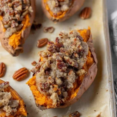 Pecan Pie Twice Baked Sweet Potatoes garnished with pecans