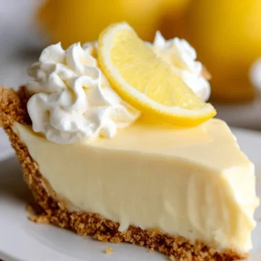 Delicious lemon pie with creamy filling and crust, a perfect dessert recipe.
