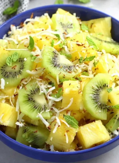 Fresh pineapple kiwi salad served in a bowl with vibrant colors and textures