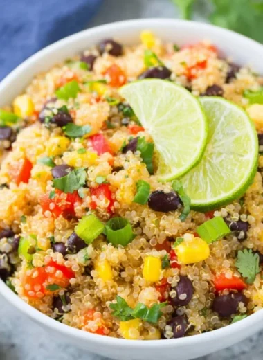 A vibrant Southwest quinoa salad with black beans, corn, and fresh vegetables.