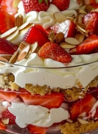 Delicious Strawberry Cheesecake Trifle layered with fresh strawberries and creamy cheesecake