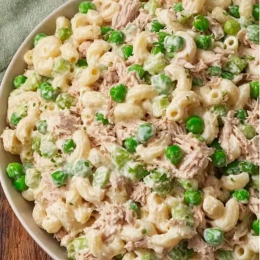Delicious and fresh tuna pasta salad in a bowl with colorful vegetables.