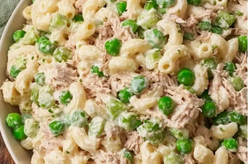 Delicious and fresh tuna pasta salad in a bowl with colorful vegetables.