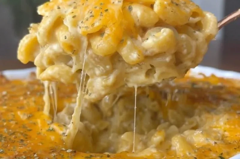 Delicious Buffalo Mac and Cheese topped with spicy sauce and melted cheese