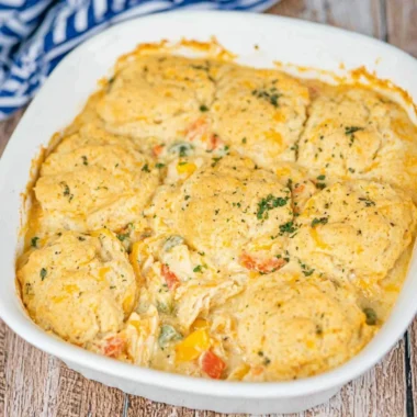 Cheddar Bay Chicken Pot Pie Casserole served in a cozy dish with herbs and cheese.