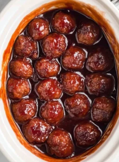 Crockpot BBQ Grape Jelly Meatballs served in a slow cooker