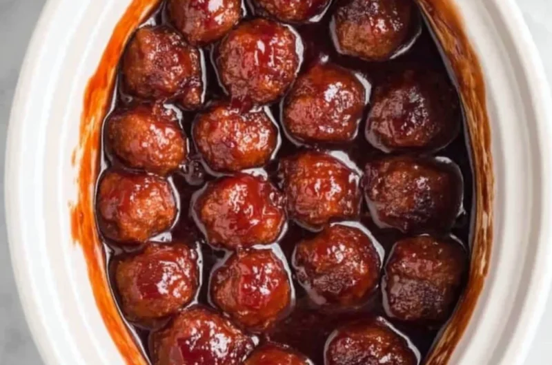 Crockpot BBQ Grape Jelly Meatballs served in a slow cooker