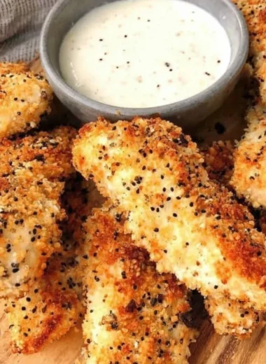 Delicious Everything Bagel Chicken Tenders served with dipping sauce