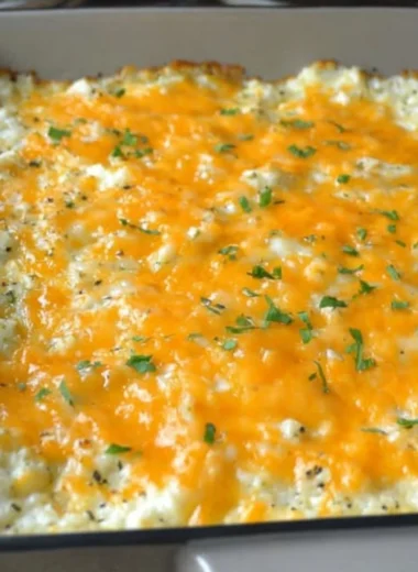 Delicious Green Chile Cauliflower Casserole served in a baking dish