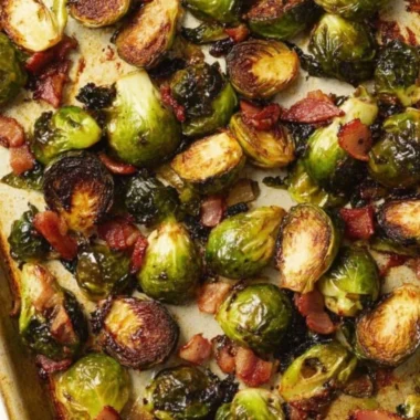 Ina Garten's roasted Brussels sprouts recipe showcasing delicious seasoning and presentation.