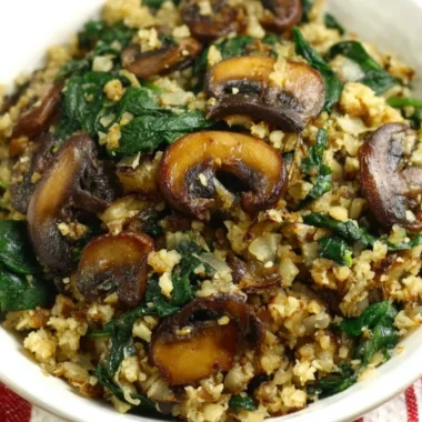 Delicious Mushroom Spinach Cauliflower Rice dish served in a bowl