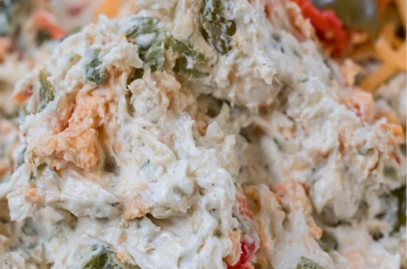 Delicious homemade olive dip served with fresh vegetables and crackers