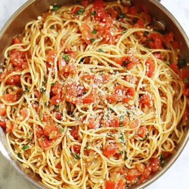 Delicious One Pot Pasta meal served in a bowl with fresh herbs and vegetables.
