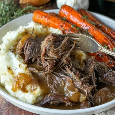 Delicious slow cooker classic pot roast served with vegetables on a rustic table.