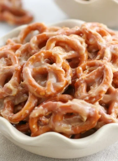 Delicious caramel pretzels drizzled with chocolate and sprinkled with sea salt