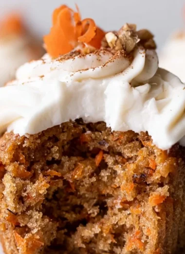 Delicious carrot cake cupcakes topped with cream cheese frosting