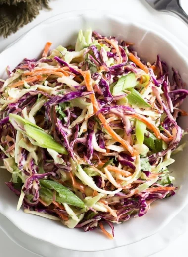 Delicious coleslaw served with pulled pork sandwiches