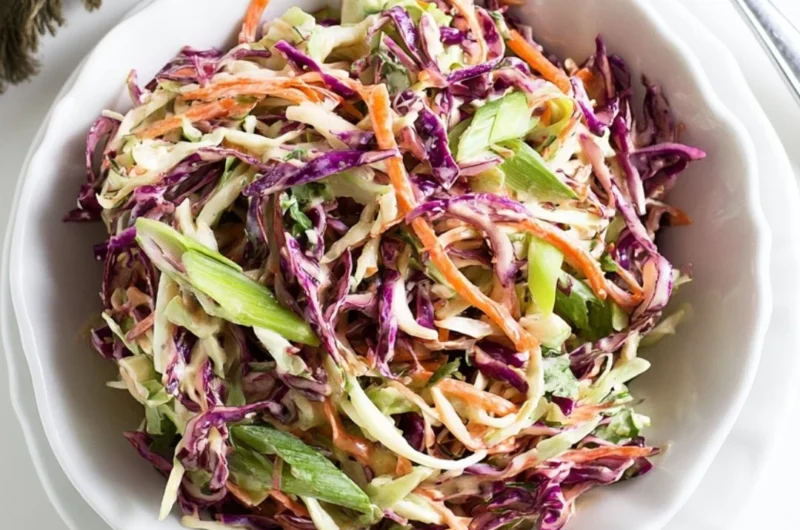 Delicious coleslaw served with pulled pork sandwiches