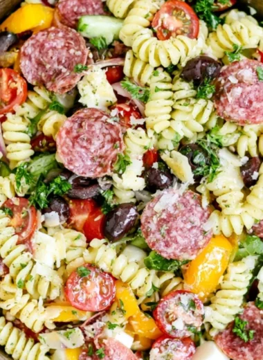 Colorful Italian Pasta Salad with fresh vegetables and dressing