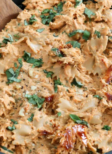 Delicious plate of Marry Me Chicken Pasta garnished with herbs