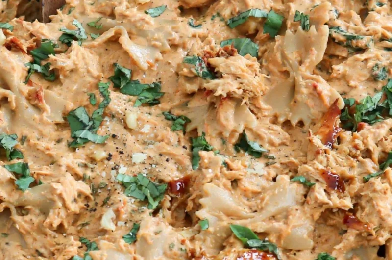 Delicious plate of Marry Me Chicken Pasta garnished with herbs