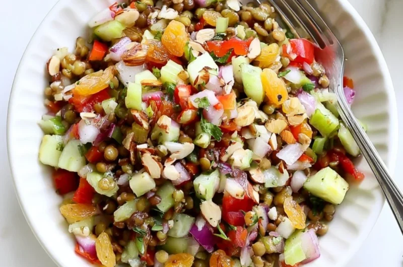 Delicious and nutritious lentil salad served in a bowl with fresh vegetables.